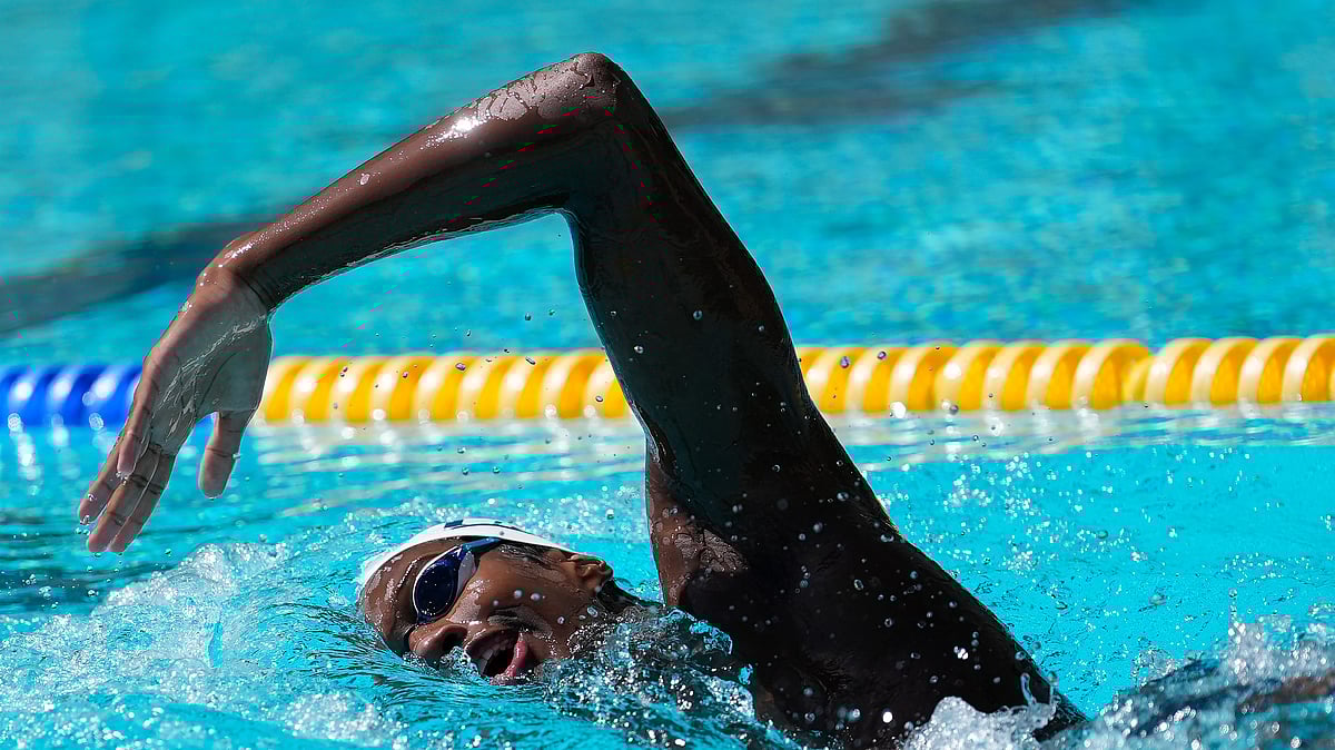  (AP Photo/Jeff Chiu) : Ziyad Saleem swims while being interviewed in Berkeley, Calif., Tuesday, May 28, 2024. Saleem, a University of California swimmer, is headed to the Paris Olympics to swim for Sudan, his parents' home country and one almost all of his relatives have now fled because of war and a massive humanitarian crisis.